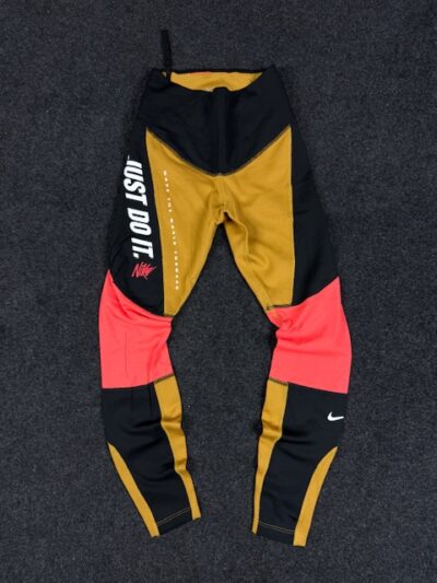 Nike Women Black & Mustard Brown Colourblocked Tight Fit SPT DST BTR Dri-FIT Tights