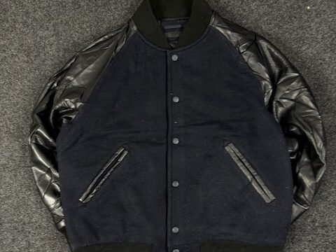 UNIQLO NAVY BLUE AND BLACK VARSITY JACKET - XL