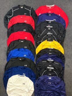 under armour compression t shirts laid out in multiple colours for fitness